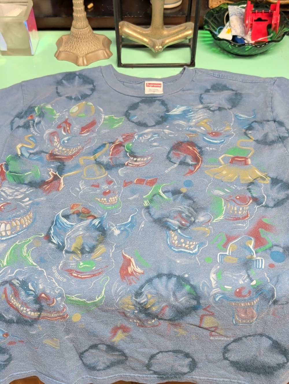Supreme Blue Tee with Multicolor Clown Faces